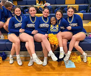 Amari with cheerleaders