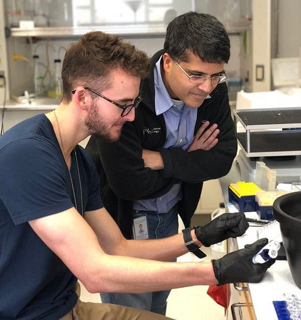 Dr. Bindra in a research lab